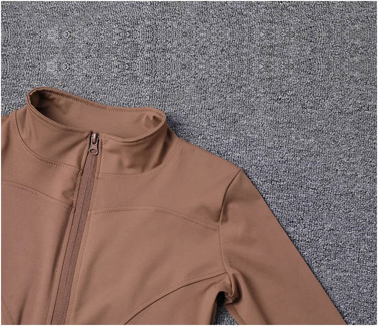Chaqueta deportiva de manga larga para mujer, ideal para entrenar en el gimnasio o practicar yoga.