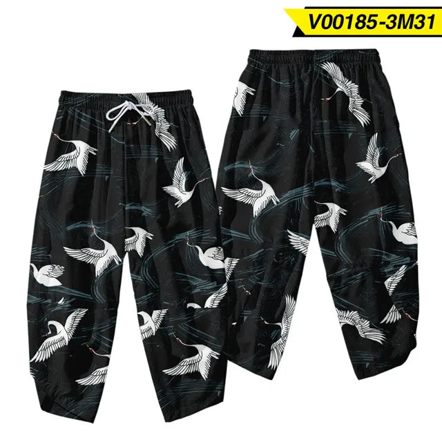 Pantalones tipo harem japoneses para hombre, negros, con estampado de dragón chino de dibujos animados, cintura elástica, estilo kimono, cortos, estilo urbano
