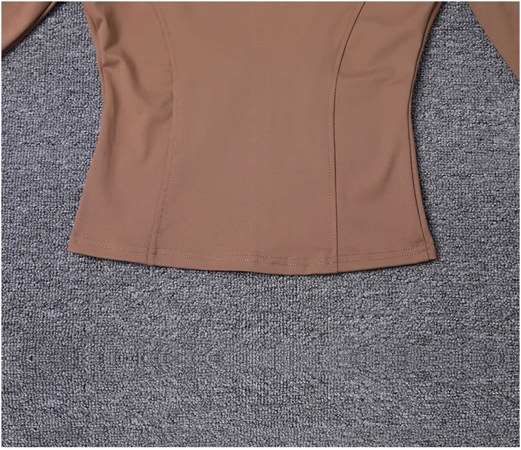 Chaqueta deportiva de manga larga para mujer, ideal para entrenar en el gimnasio o practicar yoga.